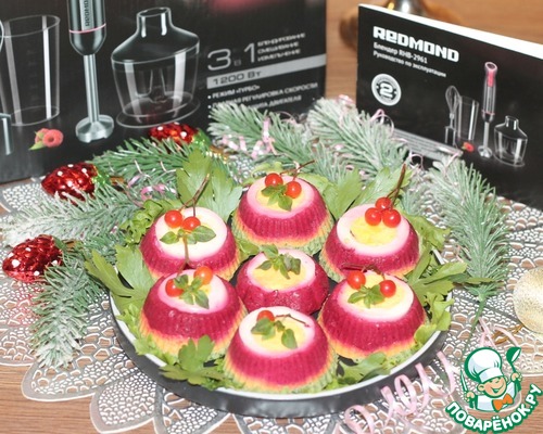 Разноцветная закуска из селедки и овощей