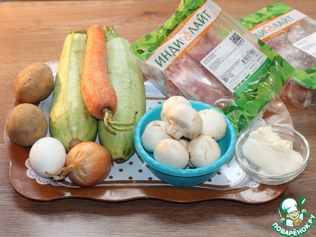 Индейка с грибами на овощной подушке